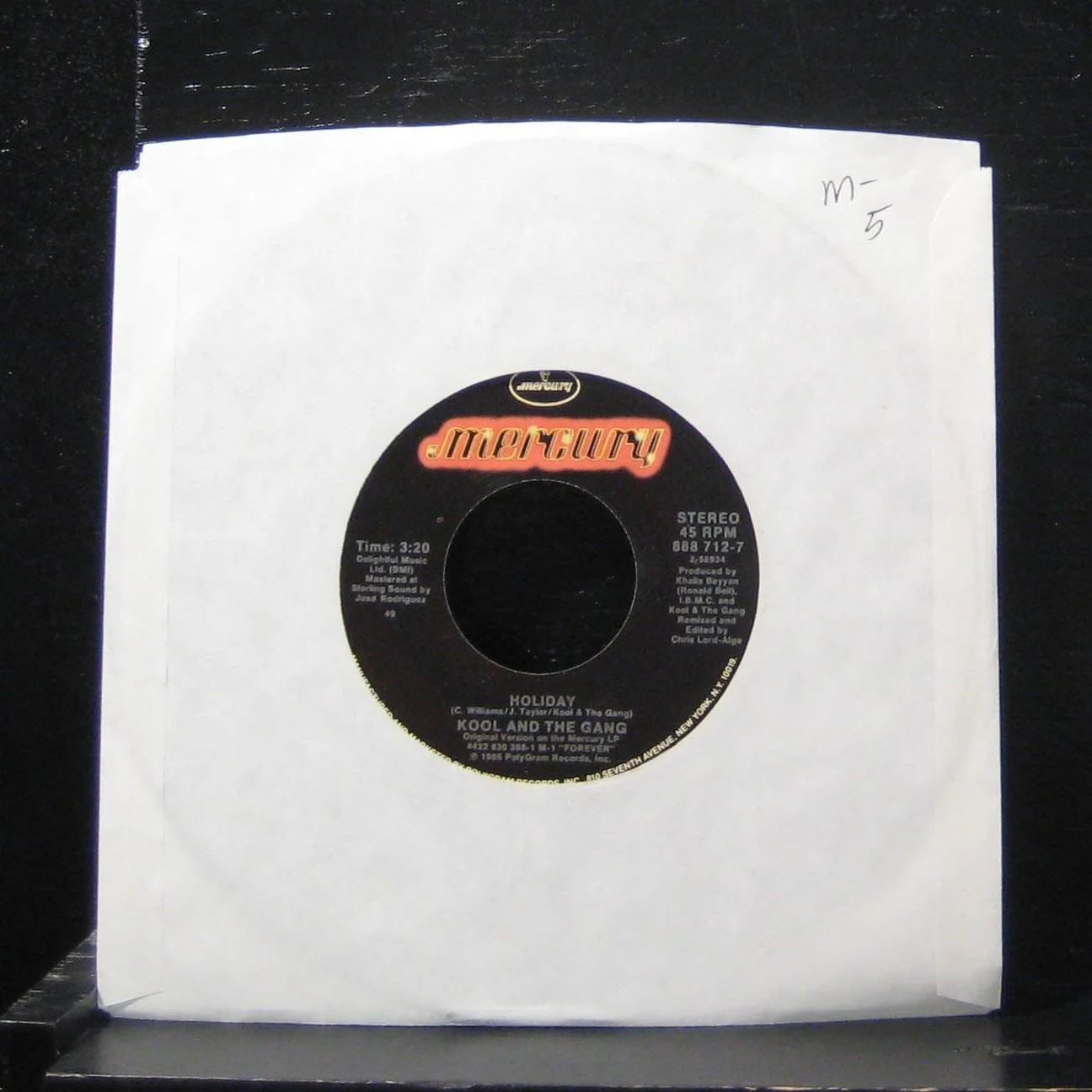 Kool And The Gang - Holiday / Jam Mix 7" Mint- 888 712-7 Vinyl 45 1986